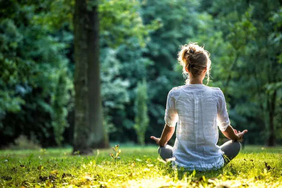 Person thoughtfully examining product ingredients in a calm setting